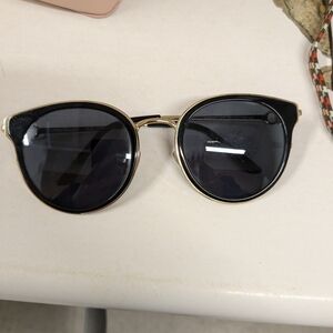 Salvatore Ferragamo Black and Gold Glasses